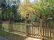 Wooden fence with gate and arbor at 5335 Saville Nw Dr, Acworth, GA 30101