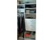 Well-organized closet with shelves, drawers, and hanging rod at 205 Crossing Valley Ln, Atlanta, GA 30339