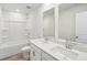 Bathroom boasts double vanity and shower/tub combo at 2761 Hawthorne Way, College Park, GA 30337