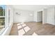 Bright dining room with hardwood floors and large windows at 2761 Hawthorne Way, College Park, GA 30337