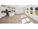 Open concept kitchen with island and access to backyard at 2761 Hawthorne Way, College Park, GA 30337