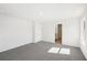 Spacious bedroom with carpet flooring and access to a bathroom at 2761 Hawthorne Way, College Park, GA 30337