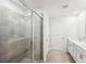 Modern bathroom with gray tile shower and double vanity at 2761 Hawthorne Way, College Park, GA 30337