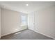 Charming bedroom with grey carpet and a window at 2761 Hawthorne Way, College Park, GA 30337