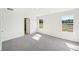 Bright bedroom with carpet flooring and two large windows at 2761 Hawthorne Way, College Park, GA 30337