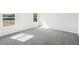 Bright bedroom featuring grey carpet and large windows at 2761 Hawthorne Way, College Park, GA 30337