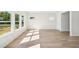 Bright dining room with hardwood floors and large windows at 2761 Hawthorne Way, College Park, GA 30337