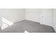 Well-lit bedroom featuring gray carpet and ample space at 2761 Hawthorne Way, College Park, GA 30337