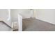 Spacious loft area with grey carpet and natural light at 2761 Hawthorne Way, College Park, GA 30337