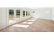 Bright dining room with hardwood floors and large windows and access to a patio at 2761 Hawthorne Way, College Park, GA 30337