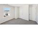 Spacious bedroom featuring grey carpet and dual closets at 2761 Hawthorne Way, College Park, GA 30337