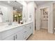 Elegant bathroom with double vanity and a large mirror at 2761 Hawthorne Way, College Park, GA 30337