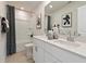 Bathroom with double vanity and shower/tub combo at 2761 Hawthorne Way, College Park, GA 30337