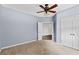 Spacious bedroom with ceiling fan and neutral wall color at 4831 Edinburgh Dr, Smyrna, GA 30082