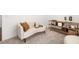 Relaxing sitting area with neutral furniture and a stylish console at 51 Airmont Dr, Sharpsburg, GA 30277