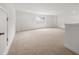 Spacious bonus room with carpet and natural light at 51 Airmont Dr, Sharpsburg, GA 30277