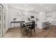 Open concept dining area with kitchen view at 51 Airmont Dr, Sharpsburg, GA 30277