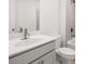 Clean bathroom with a white vanity and bathtub at 51 Airmont Dr, Sharpsburg, GA 30277