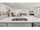Kitchen island with double sink and modern faucet at 51 Airmont Dr, Sharpsburg, GA 30277