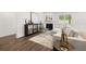 Bright living room with fireplace and comfy seating at 51 Airmont Dr, Sharpsburg, GA 30277