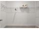 Walk-in closet with wire shelving, providing ample storage space at 51 Airmont Dr, Sharpsburg, GA 30277