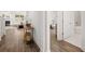 View of the entryway with hardwood floors and access to other rooms at 51 Airmont Dr, Sharpsburg, GA 30277