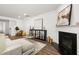 Spacious living room with fireplace and hardwood floors at 51 Airmont Dr, Sharpsburg, GA 30277