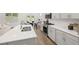 Modern kitchen with stainless steel appliances and white cabinets at 51 Airmont Dr, Sharpsburg, GA 30277