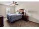 Bedroom with a bed, nightstands, and a ceiling fan at 780 Nehemiah Sw Ln, Atlanta, GA 30331