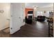 View of the foyer leading to the open living area with wood-look floors at 780 Nehemiah Sw Ln, Atlanta, GA 30331