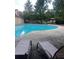 Community pool with lounge chairs at 780 Nehemiah Sw Ln, Atlanta, GA 30331