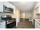 Updated kitchen with stainless steel appliances and granite countertops at 3881 Nations Dr, Douglasville, GA 30135