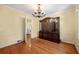 Formal dining room with hardwood floors and a large china cabinet at 2490 Cascade Sw Rd, Atlanta, GA 30311