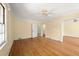 Hardwood floors and neutral walls in this sunny bedroom at 2490 Cascade Sw Rd, Atlanta, GA 30311