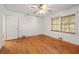 Hardwood floors and neutral walls in this spacious bedroom at 2490 Cascade Sw Rd, Atlanta, GA 30311