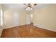 Hardwood floors and neutral walls in this spacious bedroom at 2490 Cascade Sw Rd, Atlanta, GA 30311