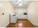 Bright kitchen features white cabinetry, wood floors, and a gas stove at 2490 Cascade Sw Rd, Atlanta, GA 30311