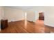 Living room with hardwood floors and views into the dining room and kitchen at 2490 Cascade Sw Rd, Atlanta, GA 30311