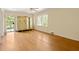 Hardwood floors, neutral walls, and access to a private balcony at 2490 Cascade Sw Rd, Atlanta, GA 30311
