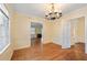Bright dining room with hardwood floors and views into the living room at 2490 Cascade Sw Rd, Atlanta, GA 30311