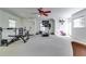 Home gym with a treadmill, weight bench and exercise bike at 965 Sundew Se Dr, Conyers, GA 30013