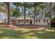 Ranch house with a covered porch and large yard at 2112 Royal Fox Way, Decatur, GA 30032