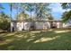 Back of house, deck, and yard at 2112 Royal Fox Way, Decatur, GA 30032