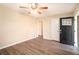 Living room featuring hardwood floors and ceiling fan at 2112 Royal Fox Way, Decatur, GA 30032