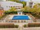 Inviting community pool with surrounding lounge chairs at 3675 Peachtree Ne Rd # 20, Atlanta, GA 30319