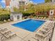 Community pool with plenty of lounge chairs at 3675 Peachtree Ne Rd # 20, Atlanta, GA 30319