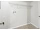Laundry area with shelving and tile flooring at 5035 Fairforest Dr, Stone Mountain, GA 30088