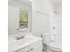 Bathroom with white vanity and shower/tub combo at 5035 Fairforest Dr, Stone Mountain, GA 30088