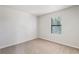 Spacious bedroom with neutral walls and carpet at 5035 Fairforest Dr, Stone Mountain, GA 30088