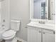 Clean bathroom with white vanity and fixtures at 5035 Fairforest Dr, Stone Mountain, GA 30088